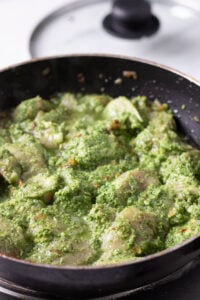 sauteing hara masala chicken till it changes colour