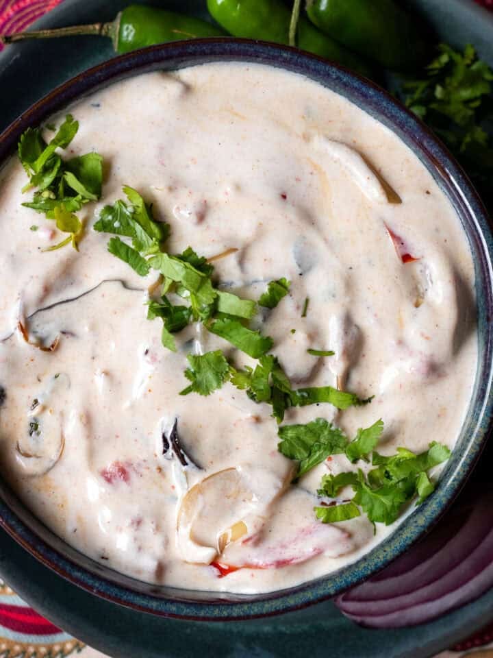 top down view of sabzi raita garnished with cilantro
